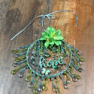 Decorative Hanging Ornament with Green Accents